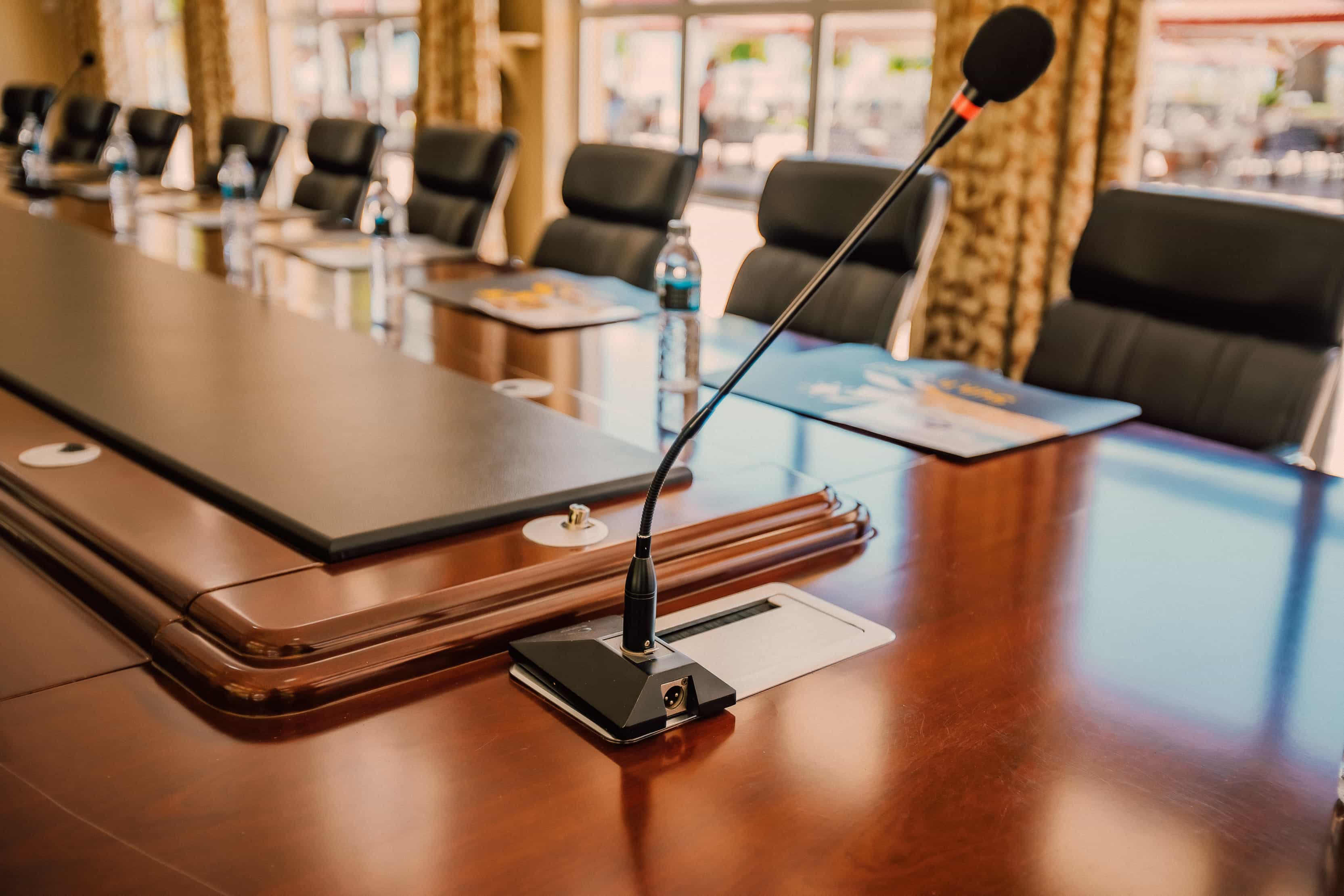 close up of microphone on boardroom table