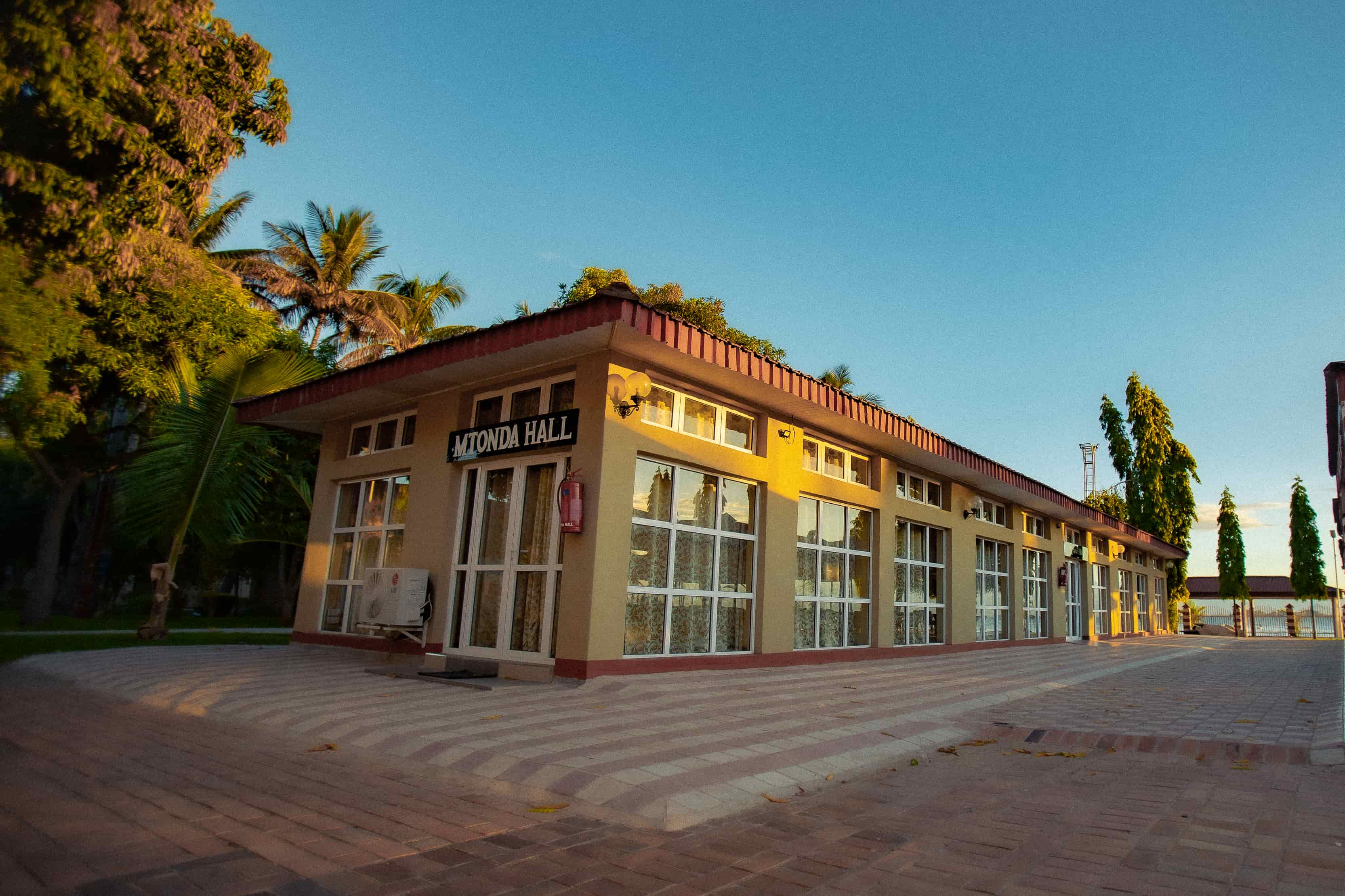 outside view of mtonda hall with sign