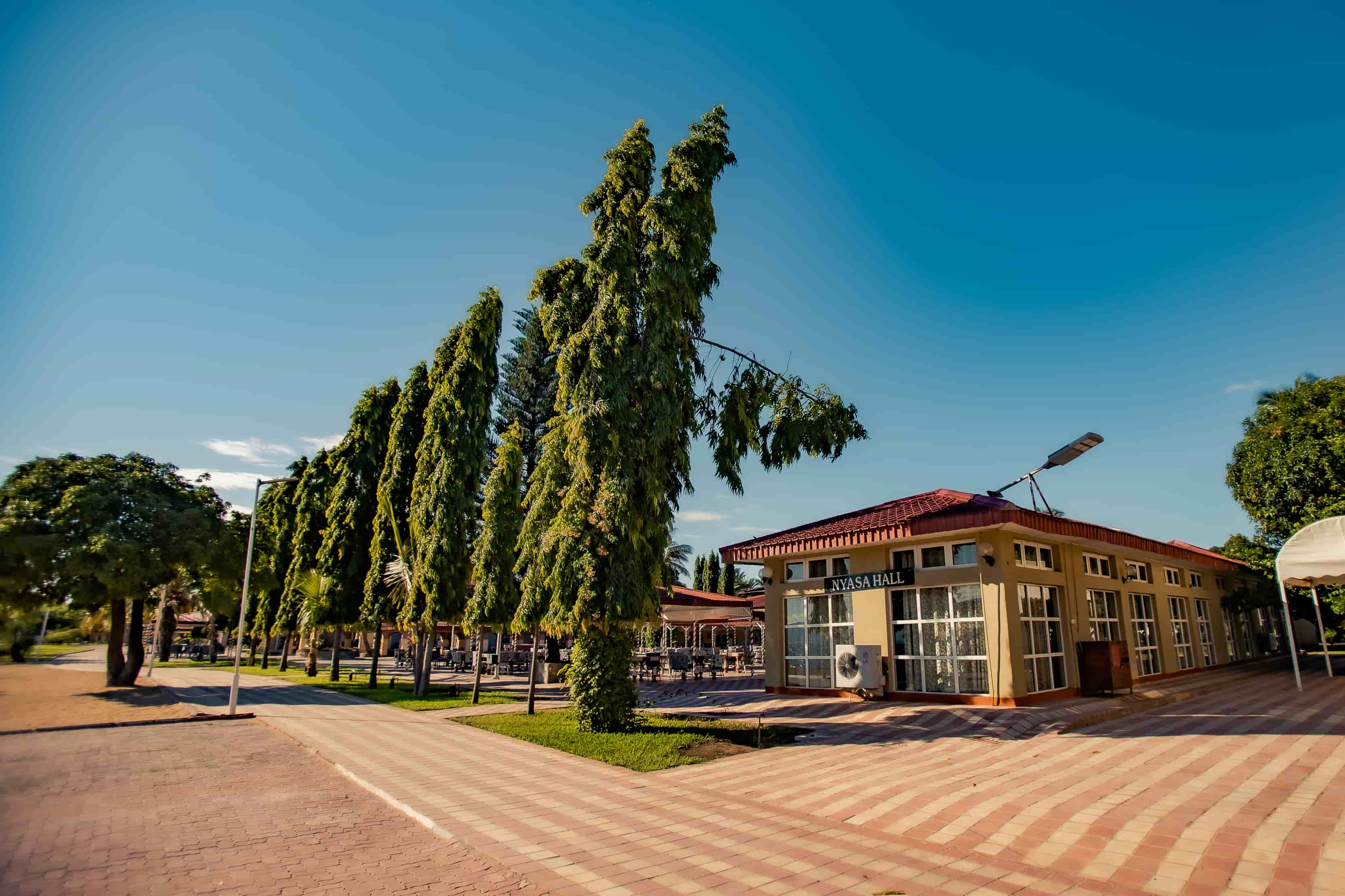 outside view of nyasa hall with sign