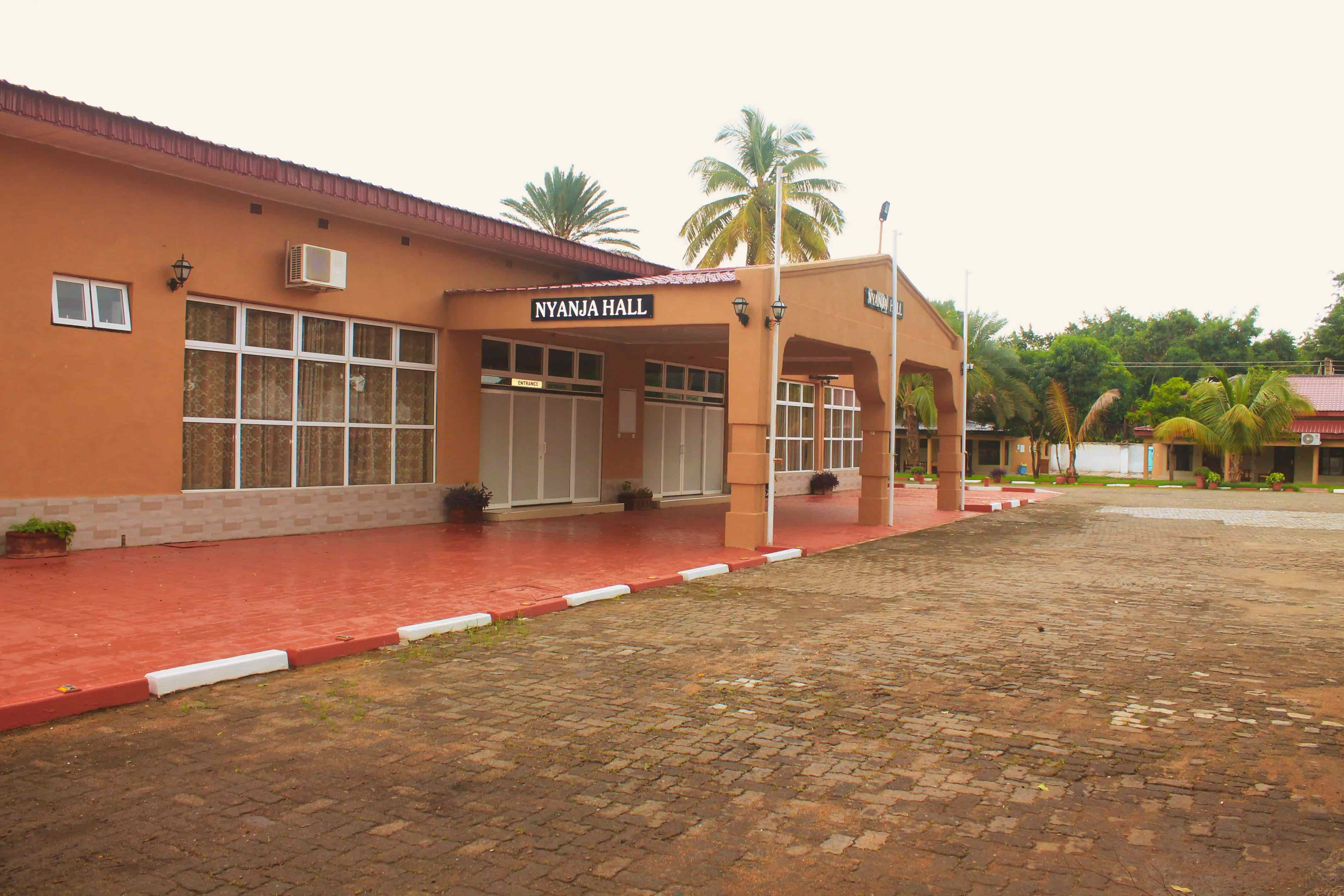 outside view of entrance of nyanja hall with sign