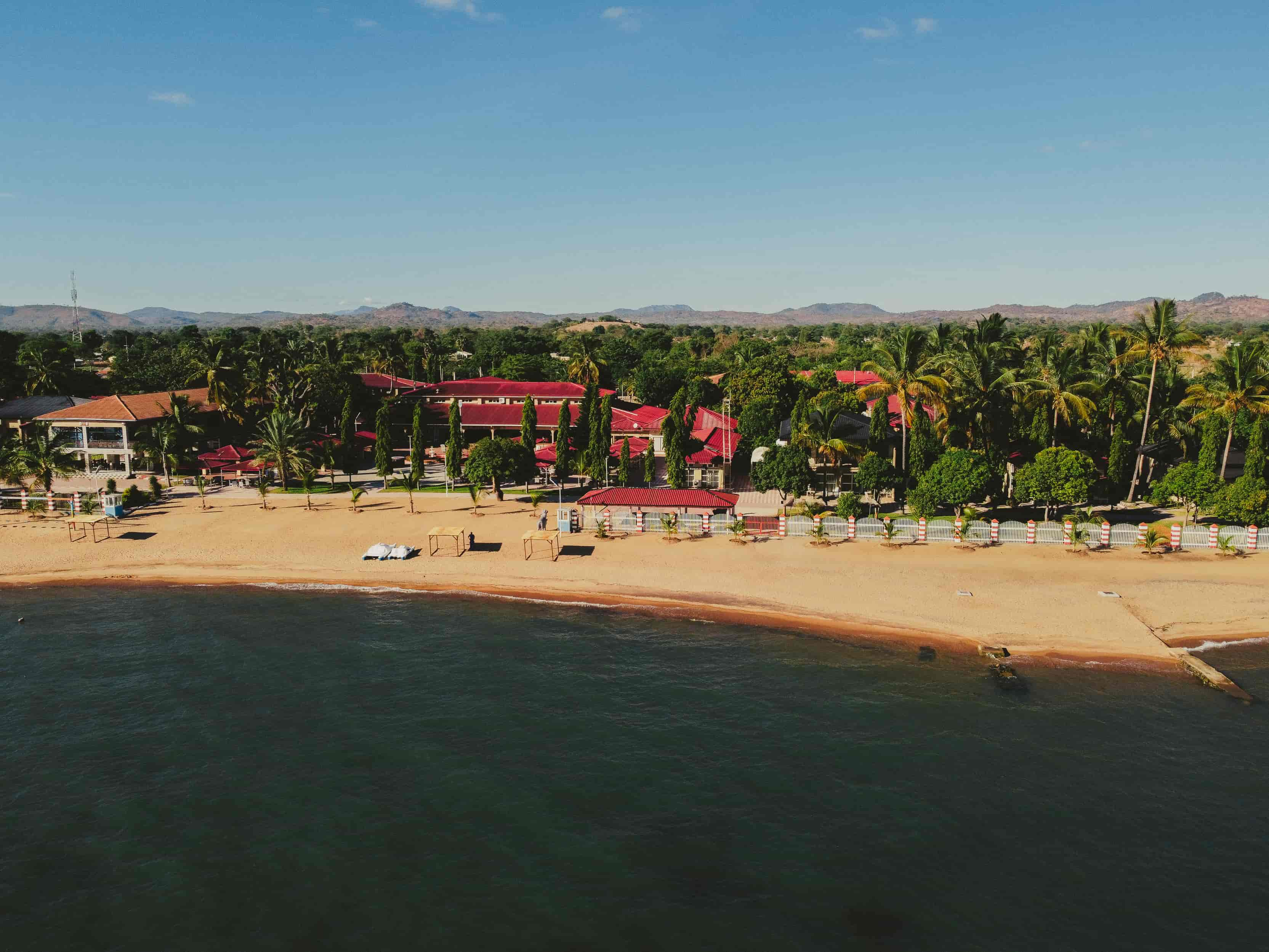 aerial view of beach and lake