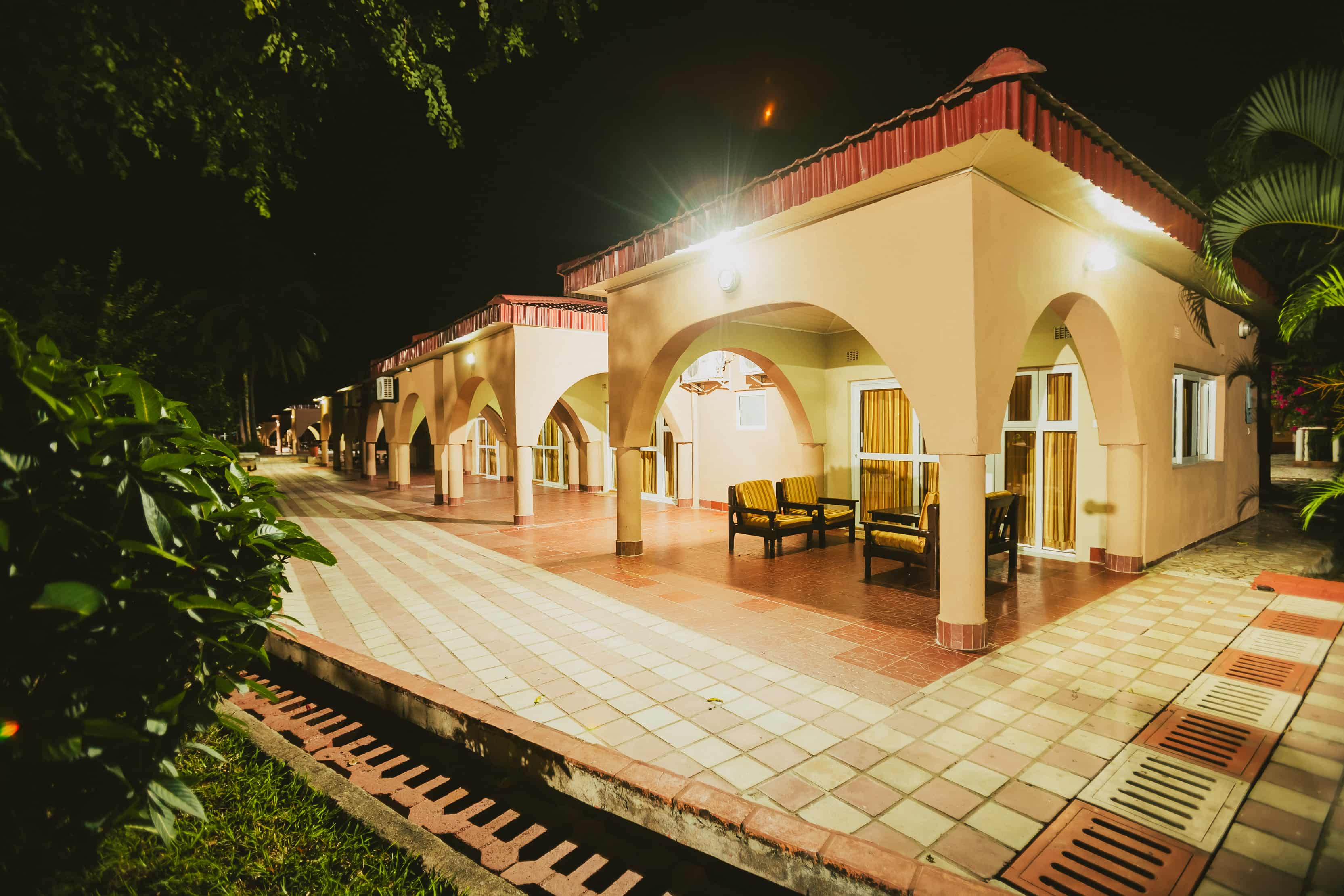 outside view of chalet rooms at night