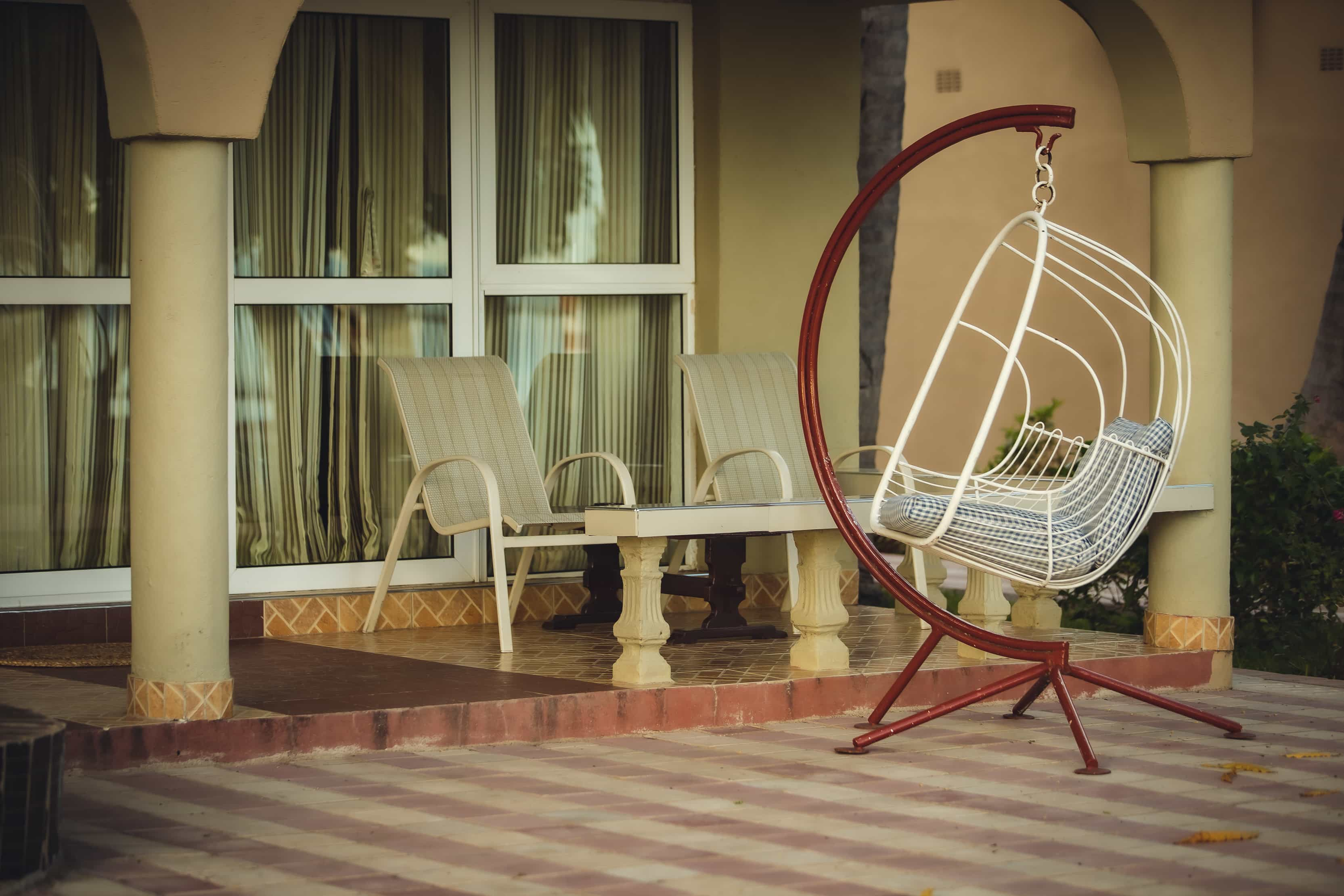 close up of swing and chairs in front of room